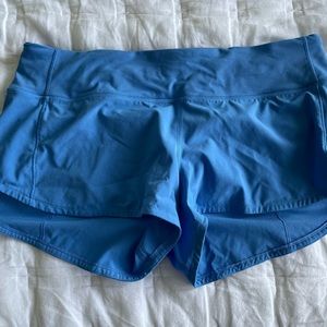 Lululemon 2.5” speed up shorts (blue, size 8)